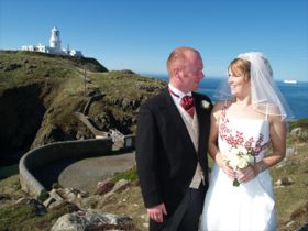 Wedding couple on the coastline