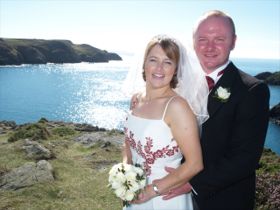 Wedding couple on the coastline