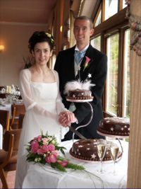 Wedding couple cut the cake